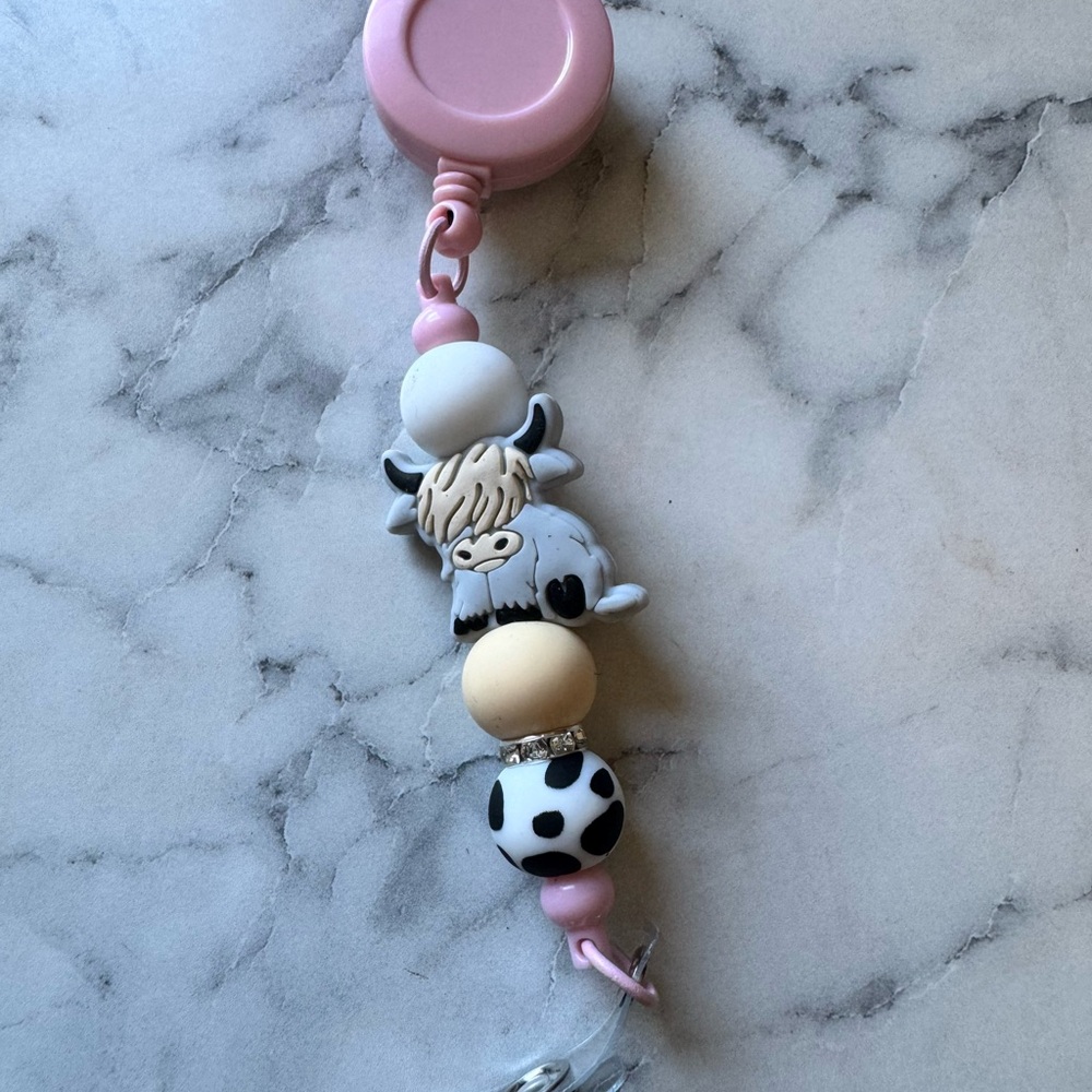 Cute Cow-Themed badge reel